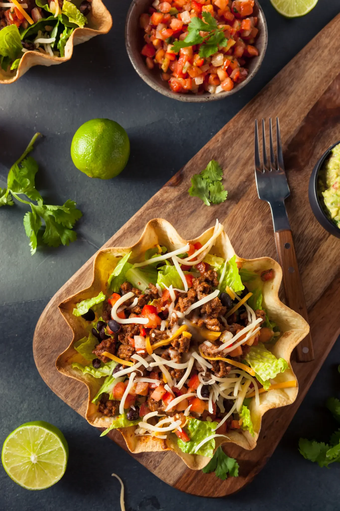 Taco Salad - Crispy tortilla bowl filled with fresh salad